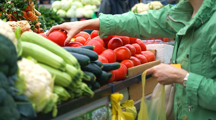 A shopper picks out fresh food for a heart healthy diet